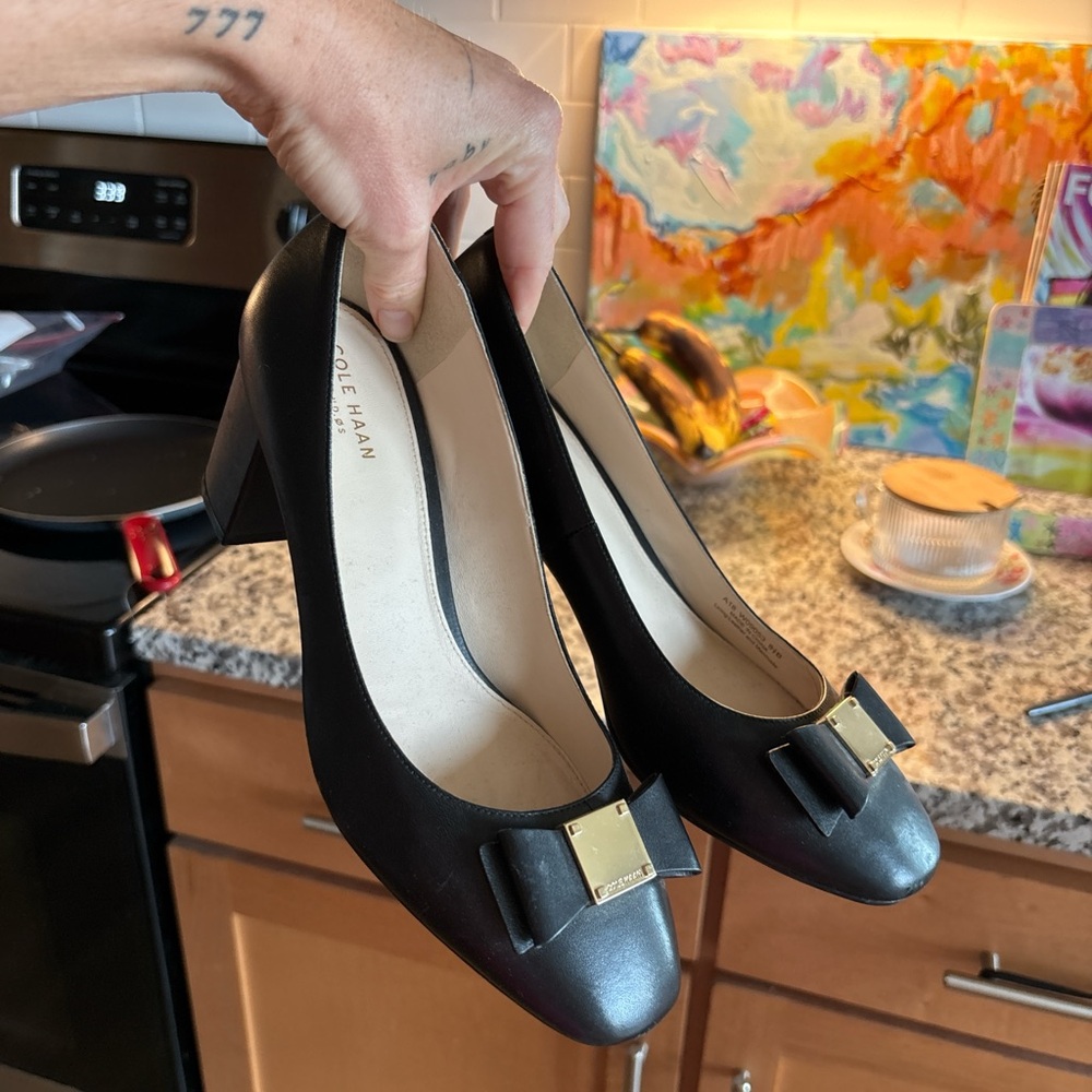 Cole Haan Black Heels with Gold Bow Detail